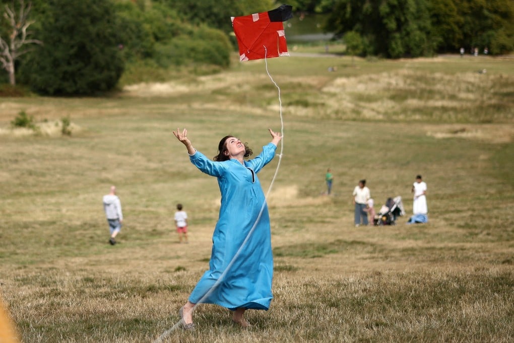 A person flies a kite on Parliament Hill, London on Saturday during ‘Fly With Me’, a kite festival celebrating Afghan culture during the one-year anniversary of the country falling into Taliban rule. Photo: Reuters