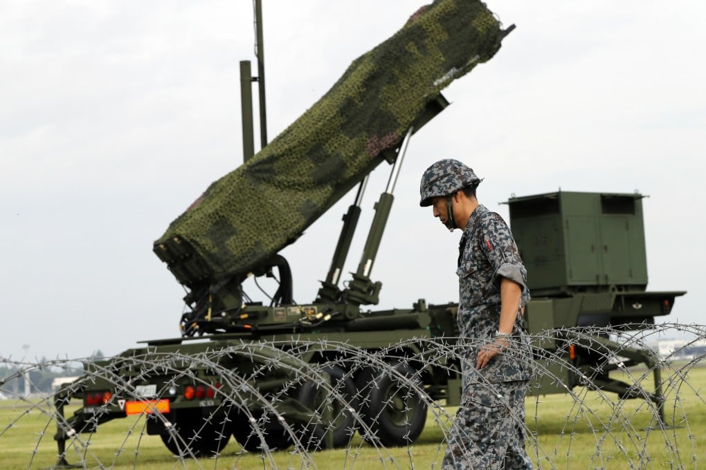 Japan is considering amassing an arsenal of more than 1,000 of its planned long-range missiles, the Yomiuri newspaper reported, citing unidentified people with knowledge of the plans. Photo: AP/File