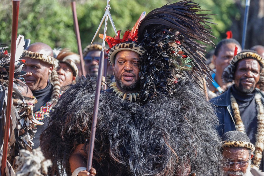 Misuzulu Zulu, new king of the Amazulu nation, holds a spear during his coronation at the KwaKhangelamankengane Royal Palace in Kwa-Nongoma, near Durban, South Africa on Saturday. Photo: AFP