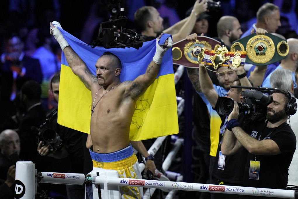 Ukraine’s Oleksandr Usyk celebrates after beating Britain’s Anthony Joshua to retain his world heavyweight title at King Abdullah Sports City in Jeddah, Saudi Arabia. Photo: AP