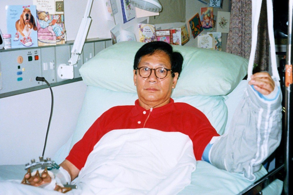 Hong Kong talk show host Albert Cheng in hospital following surgery was attacked by two men with cleavers on his way to work in 1998. Photo: SCMP