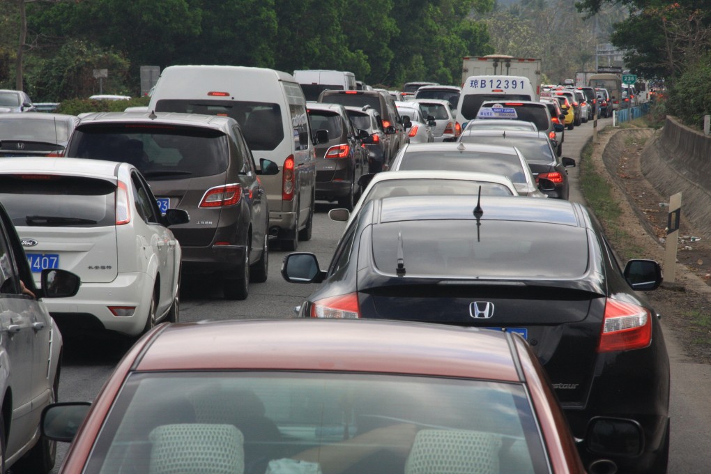 A traffic jam on an expressway in Sanya city, Hainan province. The Hainan government says that 45 per cent of vehicles on its roads would be powered by batteries by 2030. Photo: Imaginechina