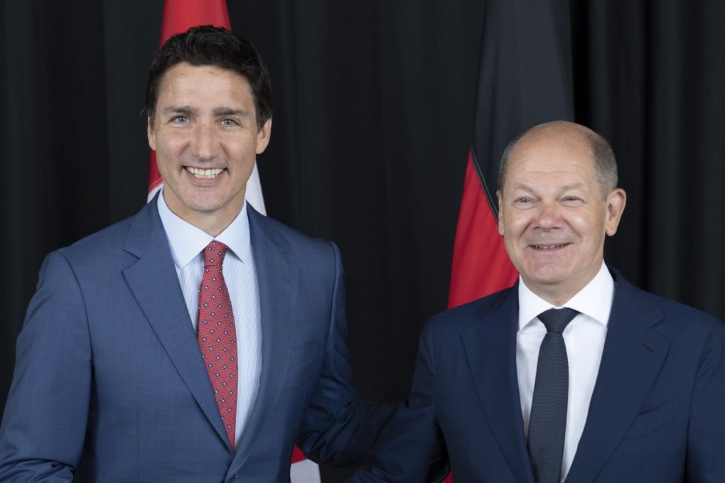 Canadian Prime Minister Justin Trudeau greets German Chancellor Olaf Scholz in Montreal on Monday. Photo: AP