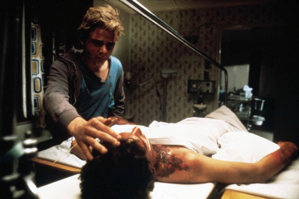 C. Thomas Howell (left) in a still from The Outsiders: The Complete Novel (category IIB), directed by Francis Ford Coppola. Matt Dillon and Ralph Macchio co-star.