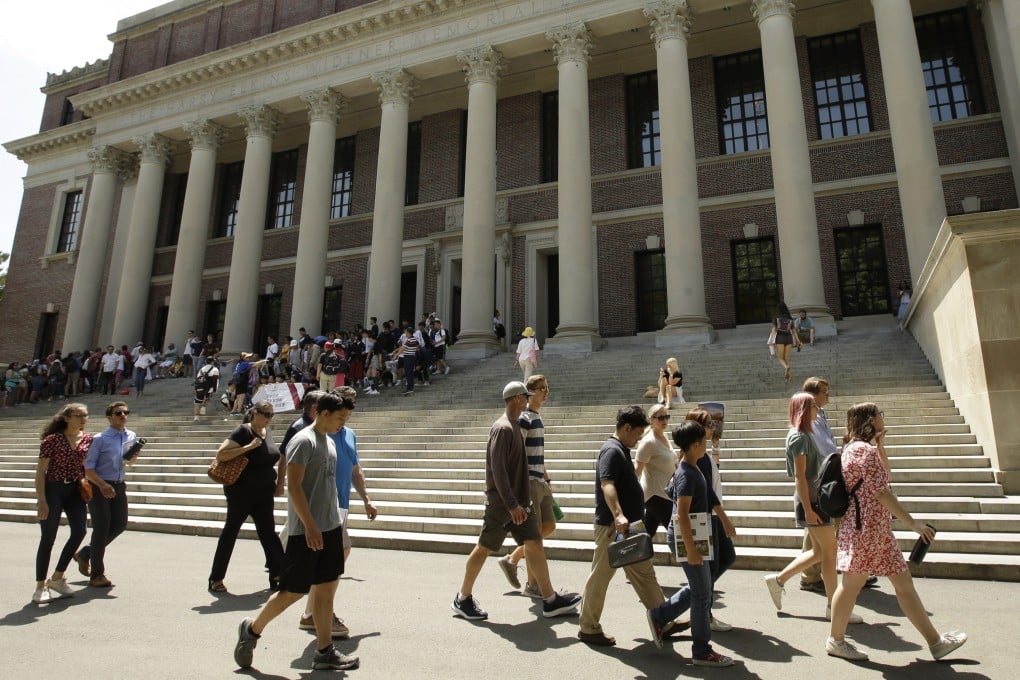 People pass the Widener Library at Harvard University in Massachusetts, US. Photo: AP