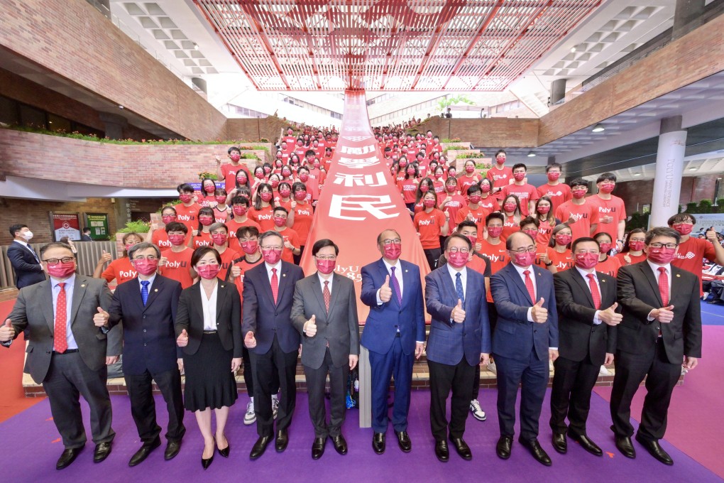 John Lee with officials and university representatives at the opening ceremony of the new PolyU entrance. Photo: Handout