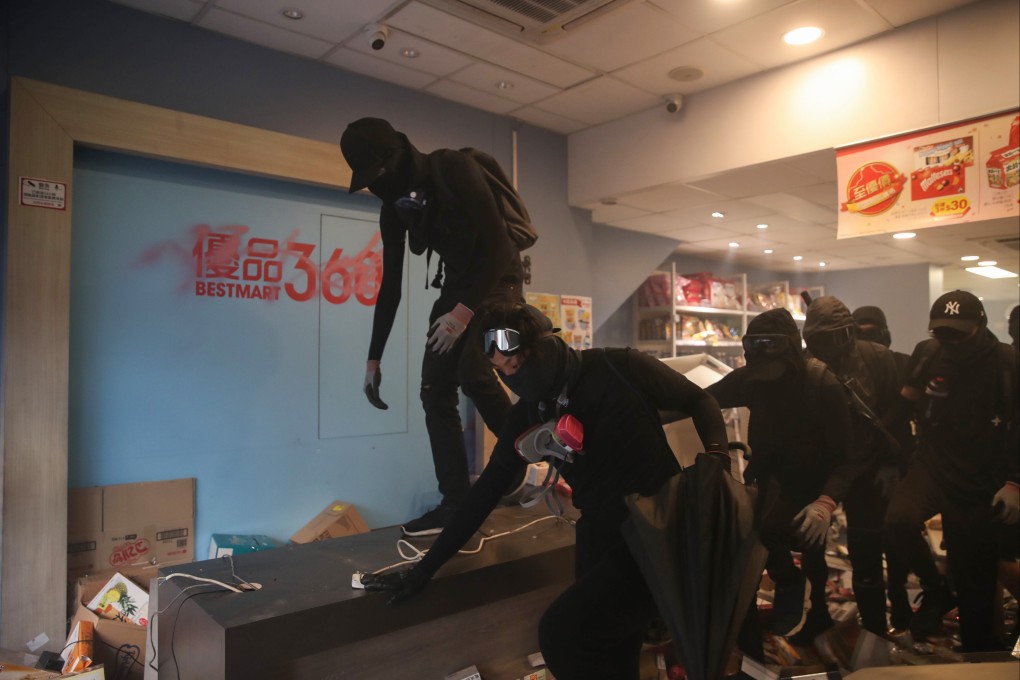 Anti-government protesters vandalise a Best Mart 360 store in Yau Ma Tei. Photo: Winson Wong