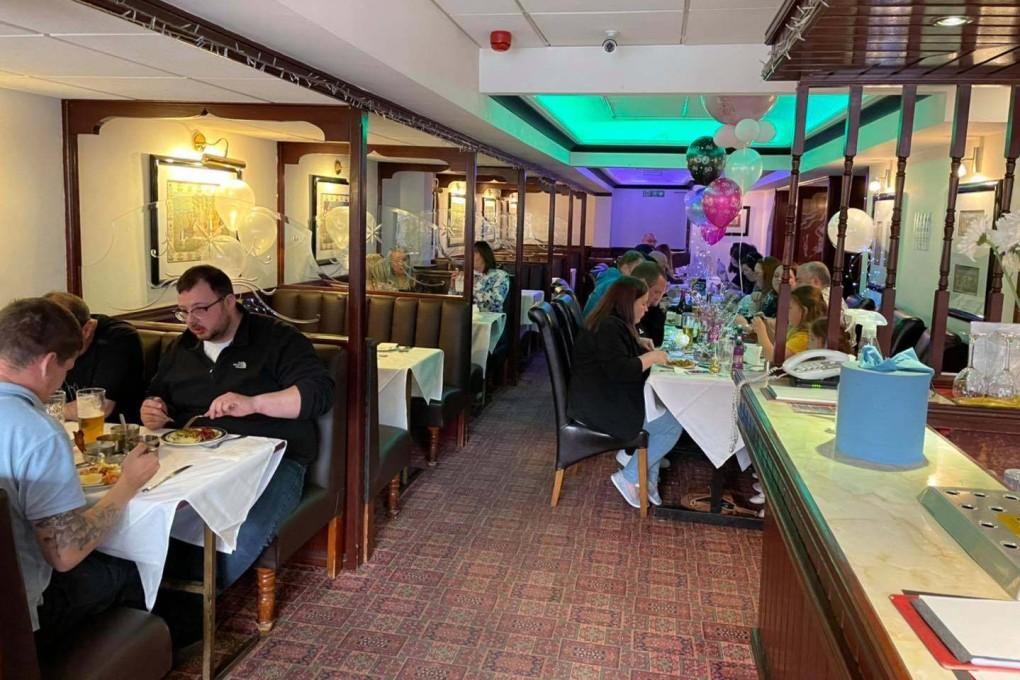 Customers dine at the Light of India restaurant in Britain. Photo: Facebook