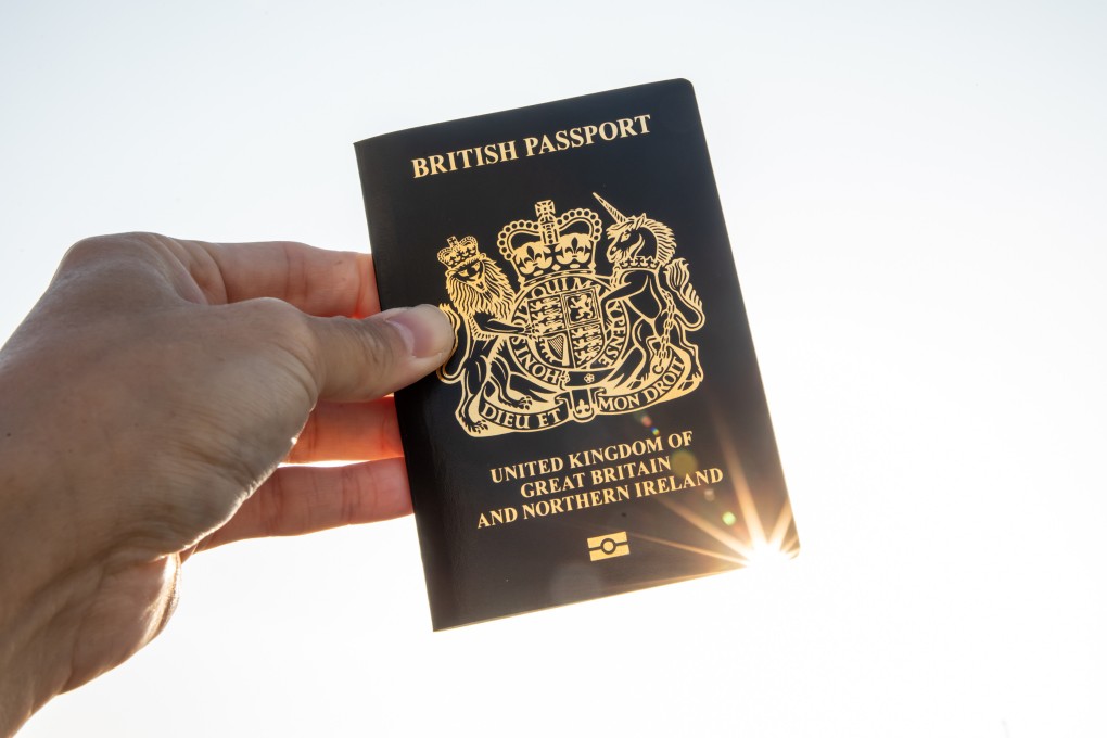 A British National (Overseas) passport, which makes holders eligible for a scheme to live and work in the United Kingdom and apply for citizenship there. Photo: Bloomberg.