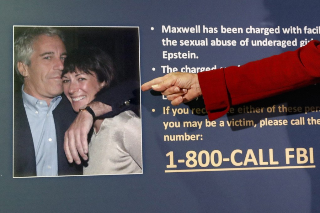 An official points to a photo of Jeffrey Epstein and Ghislaine Maxwell during a news conference, in New York in July 2020. Photo: AP