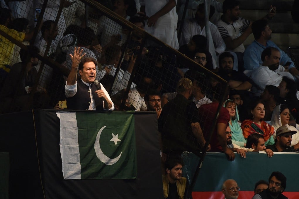Pakistan’s former prime minister Imran Khan delivers a speech to his supporters in Lahore on August 13. Photo: AFP via Getty Images/TNS