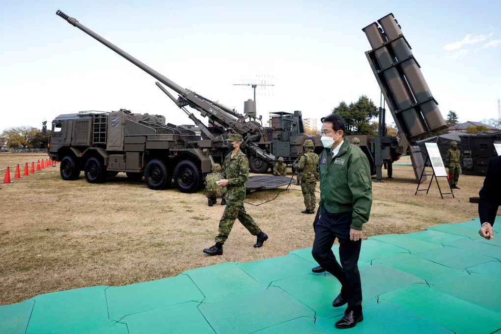 Japanese Prime Minister Fumio Kishida inspects military equipment during a review in Tokyo. File photo: Reuters