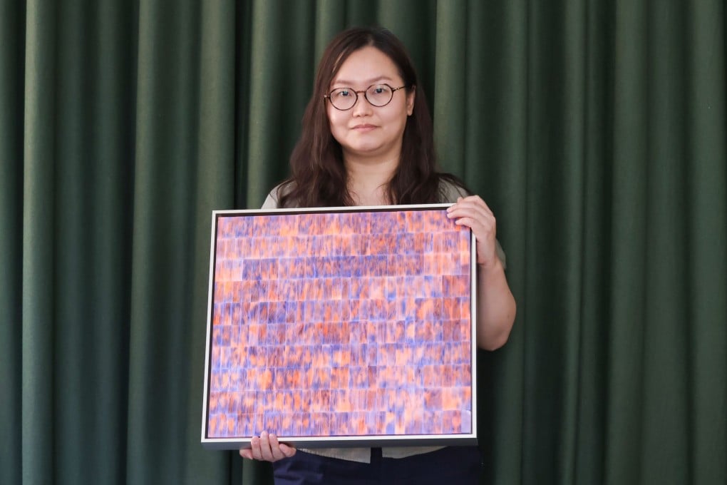 Hong Kong artist Sophie Cheung with her work Frozen Fire (2021) at Ora-Ora Gallery at Tai Kwun, in Central. Photo: Jonathan Wong