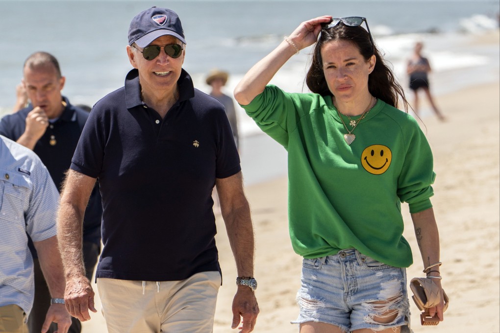 US President Joe Biden walks on the beach with daughter Ashley Biden in Rehoboth Beach, Delaware, in June. Photo: AP