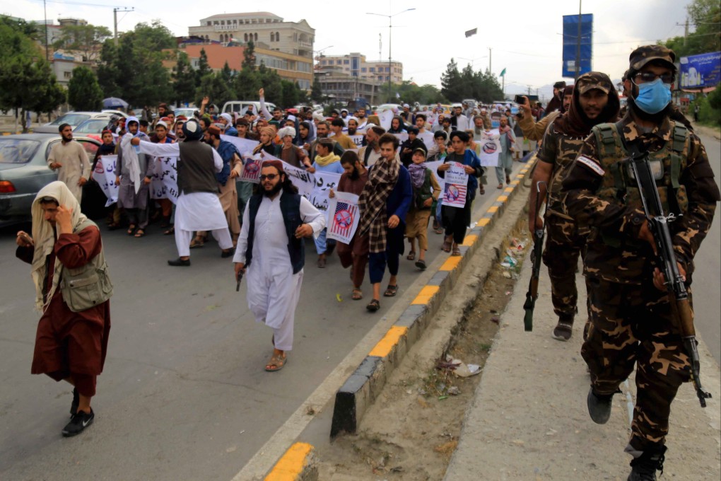 Taliban security stand guard during a protest in August 2022 against a US drone strike that killed al-Qaeda leader Ayman al-Zawahiri, in Kabul, Afghanistan in July. Photo: EPA-EFE