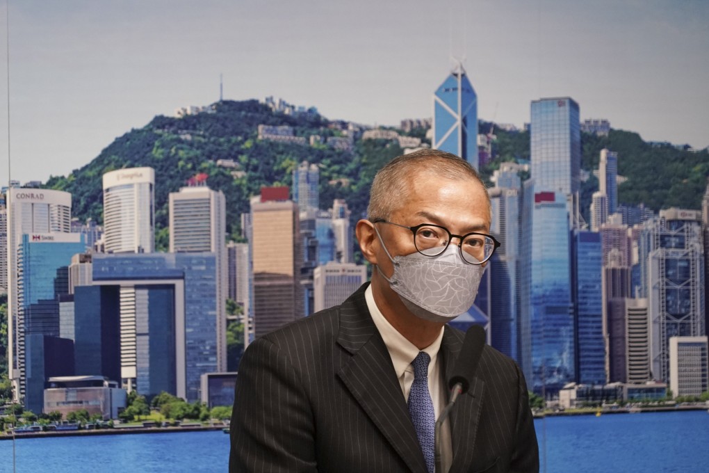 Secretary for Health 
Lo Chung-mau briefs the press on the latest pandemic situation on August 26. Photo: Felix Wong