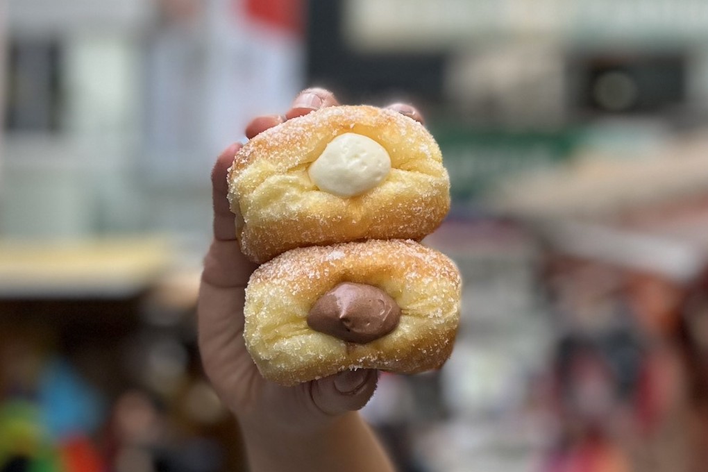 Condensed milk and chocolate cream doughnuts from Hole Foods, one of a number of online bakeries in Hong Kong that have helped end a doughnut drought in the city. Photo: Hole Foods