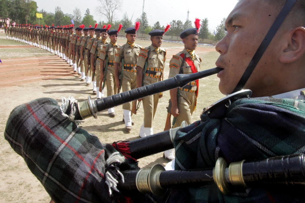 A soldier from the Indian Army’s Gurkha regiment plays the pipes during a passing-out parade ceremony of the Indo-Tibetan Border Police in northern Chandigarh city. Photo: Reuters