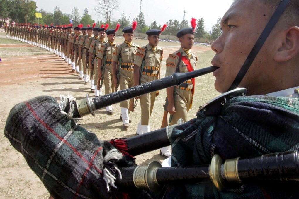 A soldier from the Indian Army’s Gurkha regiment plays the pipes during a passing-out parade ceremony of the Indo-Tibetan Border Police in northern Chandigarh city. Photo: Reuters
