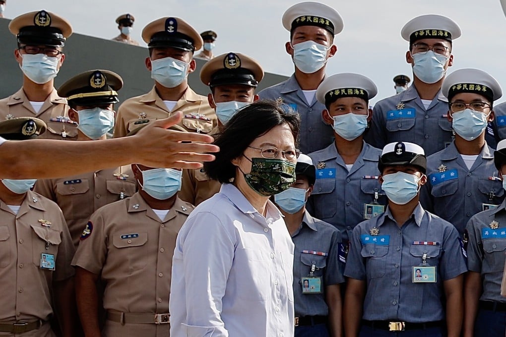 Taiwanese President Tsai Ing-wen (centre) visits navy officers during her trip to Penghu, Taiwan on Tuesday. Photo: EPA-EFE