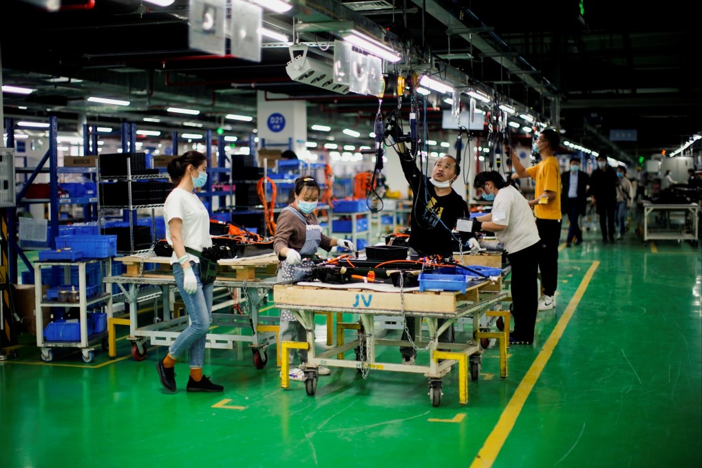 Employees work on the production line of electric vehicle battery manufacturer Octillion in Hefei, Anhui province. Photo: Reuters