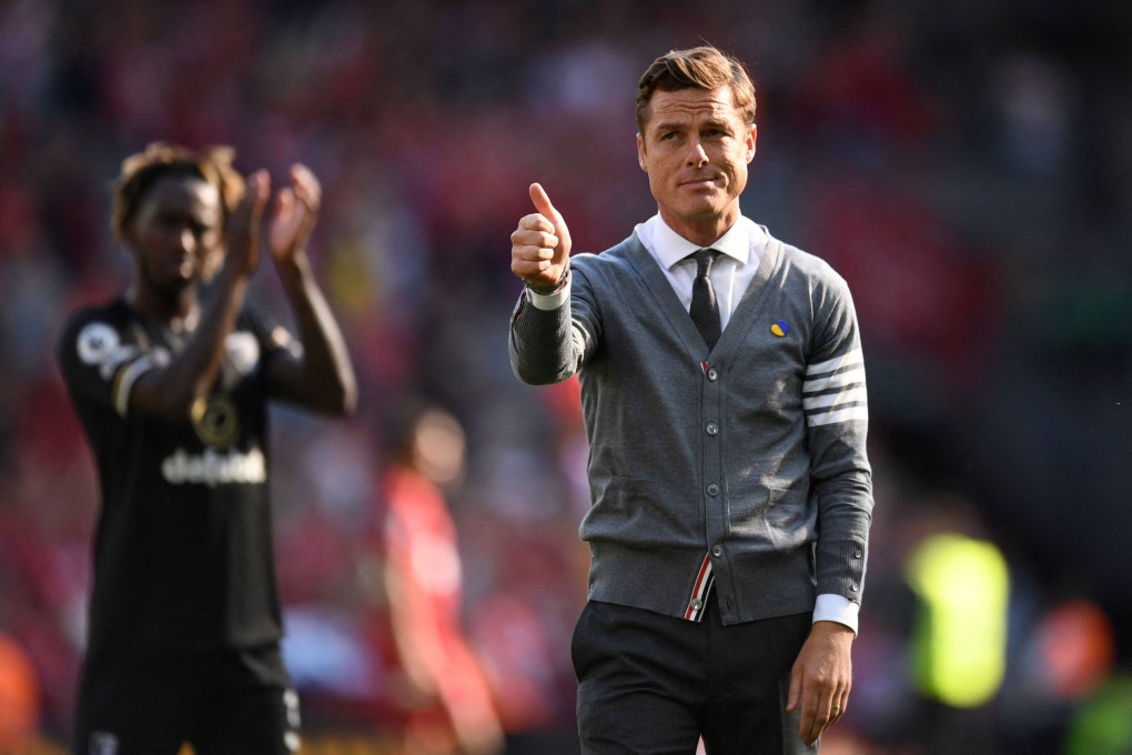 Bournemouth’s English head coach Scott Parker gestures to supporters after their 9-0 loss against Liverpool at Anfield. Photo: AFP