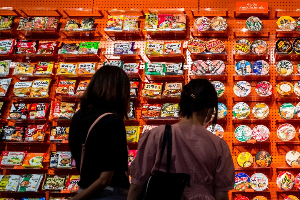 People look at instant noodles at the Good Noodle store in Bangkok, Thailand. Photo: Reuters