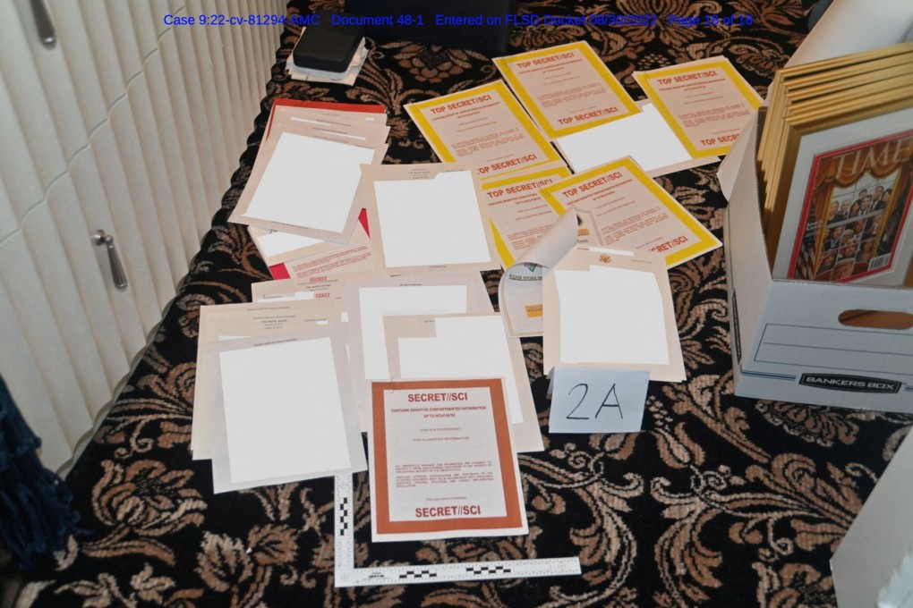 A redacted FBI photograph of documents and classified cover sheets recovered from a container stored in former US president Donald Trump’s Florida estate. Photo: US Department of Justice