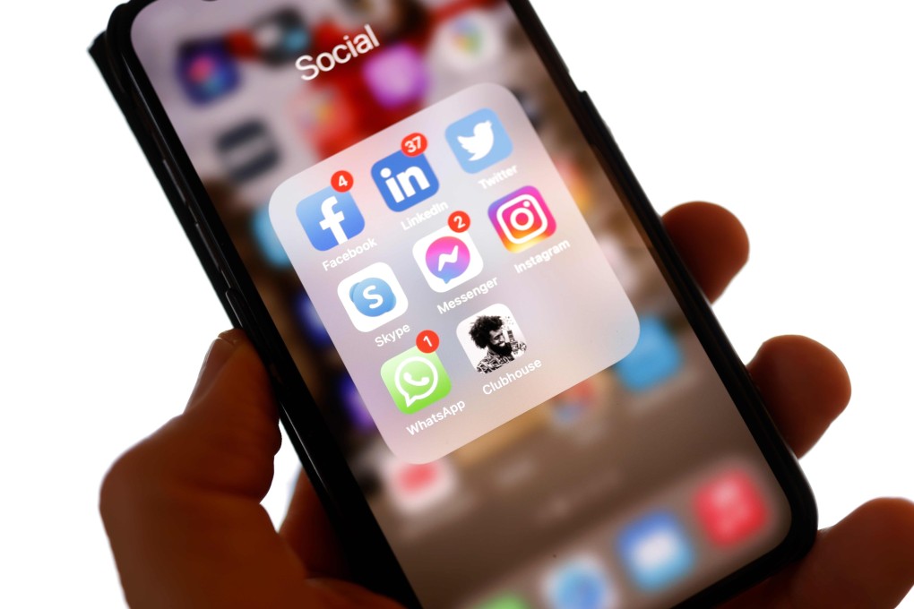 An illustration photo taken on January 25, 2021 shows the application Clubhouse on a smartphone in Berlin, after Thuringia’s state premier Bodo Ramelow admitted on the chat app to playing Candy Crush on his phone during online pandemic response meetings with German Chancellor Angela Merkel. - Bodo Ramelow, head of the eastern Thuringia state, made the confession during what he thought was a closed meeting on the invitation-only audio chatroom app Clubhouse at the weekend. (Photo by Odd ANDERSEN / AFP)