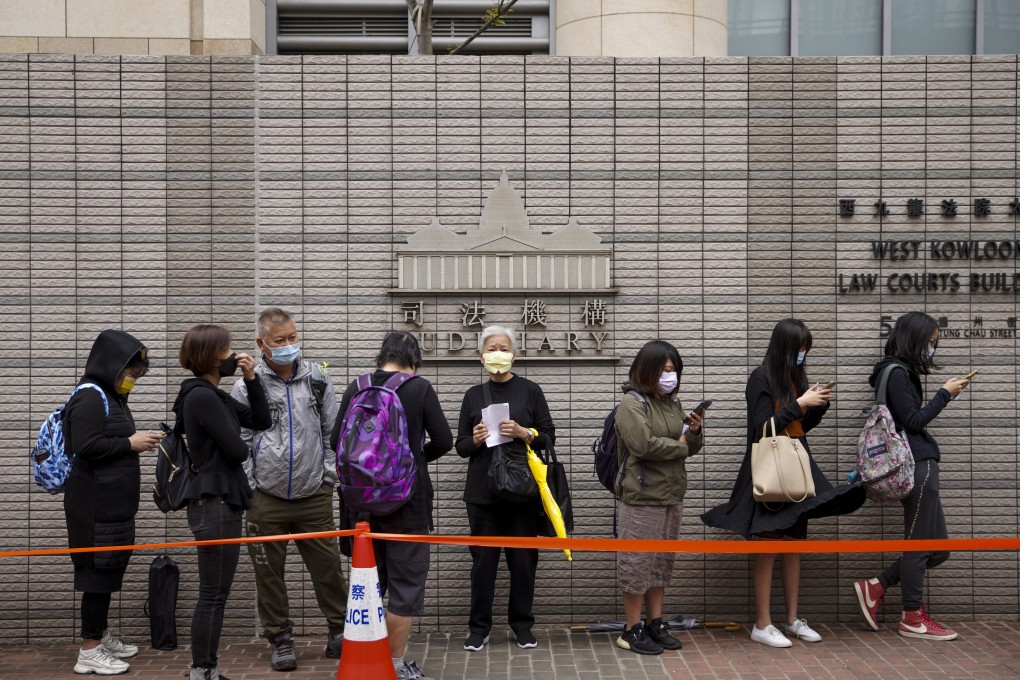 People queue to enter the West Kowloon Magistrates’ Courts on March 3, 2021, to attend a hearing for the 47 activists. The secretary for justice has since indicated that the case will be tried without a jury. Photo: Winson Wong
