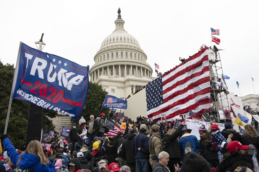 Trump supporters stand outside the US Capitol in Washington on January 6, 2021. Photo: AP