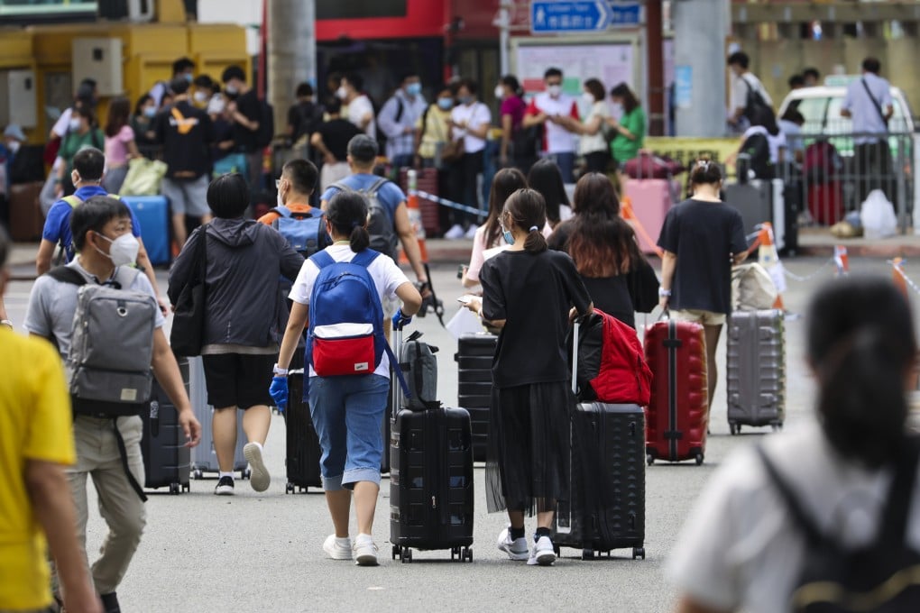 Travellers at Shenzhen Bay Port in Hong Kong head for mainland China. Photo: Dickson Lee