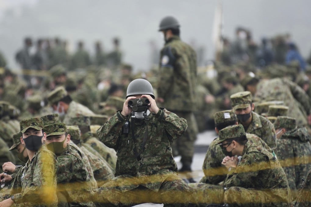 Japan’s Ground Self-Defence Forces during a live fire exercise in Gotemba. Japan is expected to strengthen its military capabilities to deter China from escalating military activities. Photo: Pool via AP