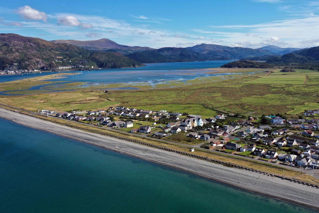 An aerial photograph shows the coast and the village of Fairbourne, on Wales’ northwest coast. Photo: AFP