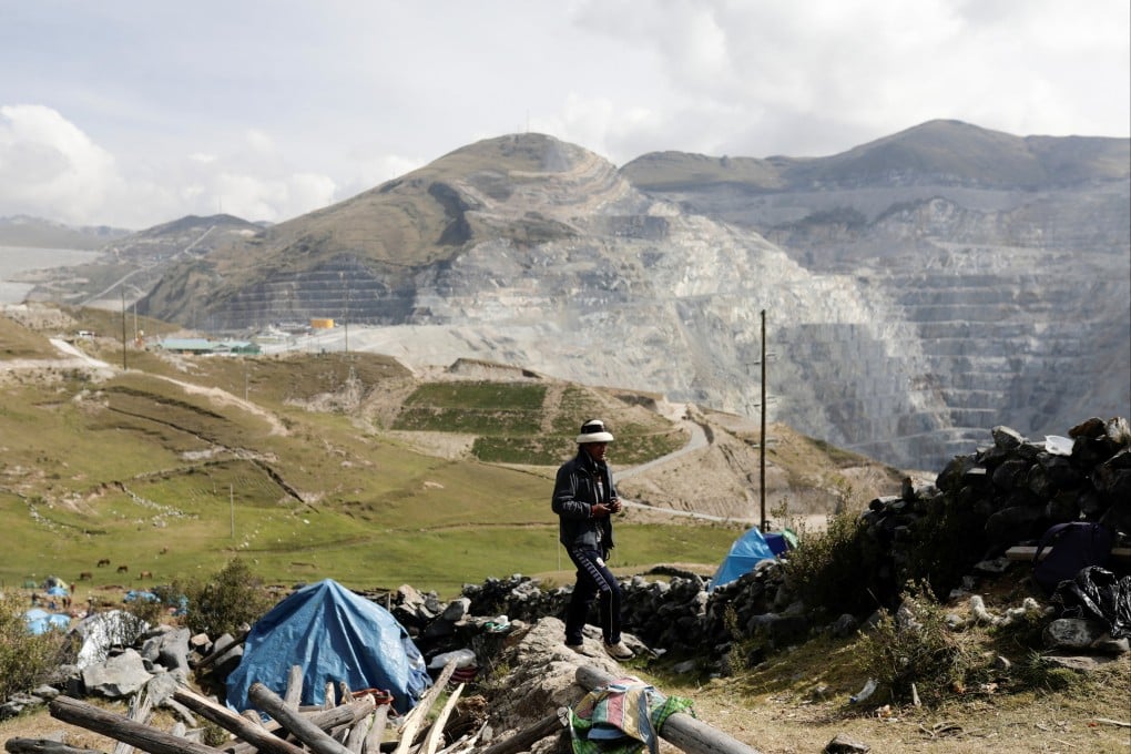 A man walks past the Chinese-controlled Las Bambas copper mine in Peru, on April 26. Members of Peru’s indigenous communities pitched camp on the mine’s property demanding the return of land used by the mine, resulting in the two-month shutdown. Photo: Reuters