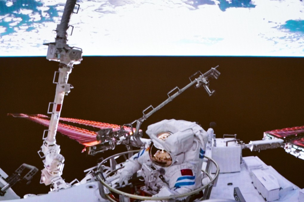 Shenzhou 14 astronaut Chen Dong returns to the space station lab module Wentian after completing a spacewalk on Friday. Photo: Xinhua