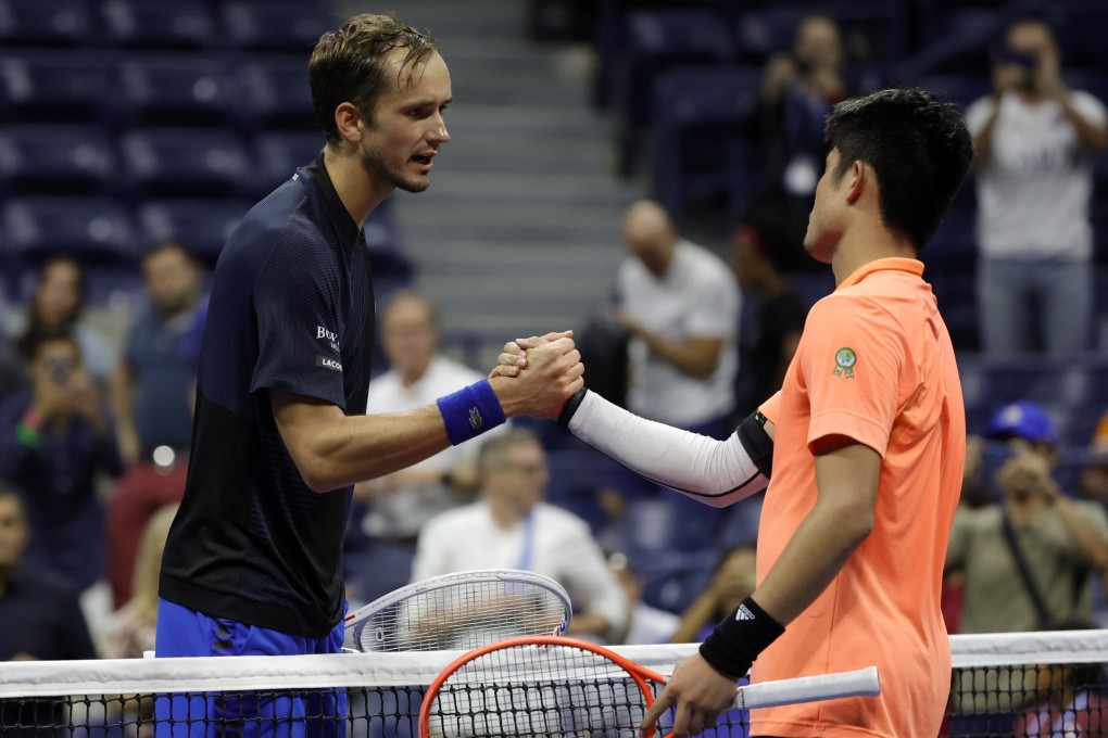 Daniil Medvedev shakes hands with Wu Yibing after their third round clash. Photo: EPA-EFE