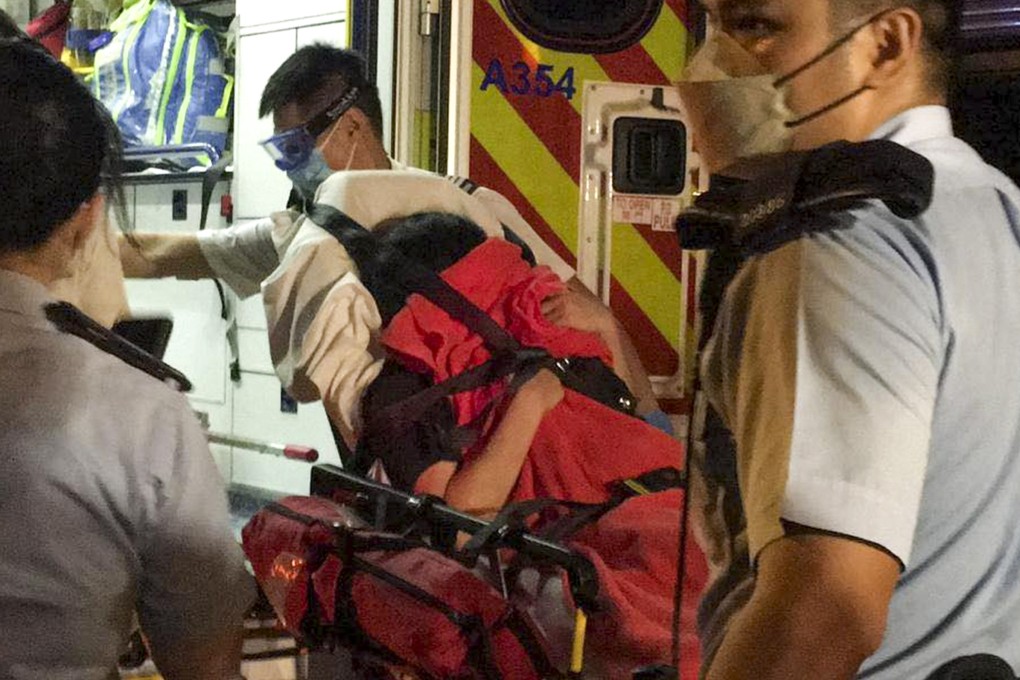 A Facebook photo of a woman being escorted into an ambulance at the scene of the incident early on Saturday morning.