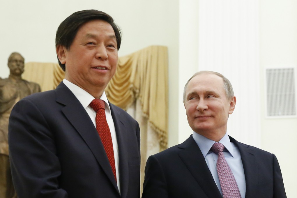 Li Zhanshu pictured with Vladimir Putin at the Kremlin in 2017. Photo: AFP
