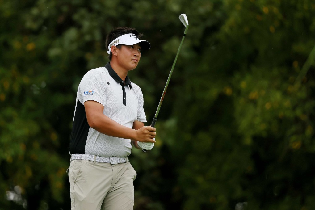 Carl Yuan of China watches a tee shot during the final round of the Korn Ferry Tour Championship in Newburgh, Indiana. Photo: AFP
