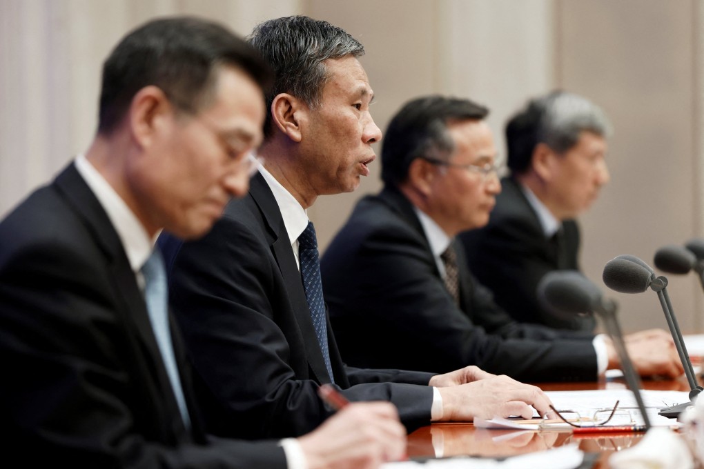Chinese finance minister Liu Kun attends a news conference with vice finance ministers Yu Weiping and Xu Hongcai, in Beijing, February 22, 2022. Photo: Reuters