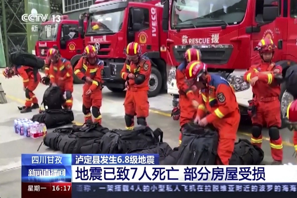 Firefighters get ready for rescue work in  Luding county of southwest China’s Sichuan province. Photo: CCTV via AP