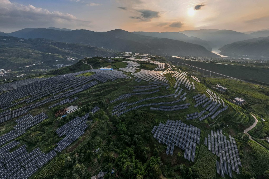 Solar panels are scattered among Sichuan pepper fields in Bijie, in China’s southwestern Guizhou province, on August 16. New research shows China could reach 80 per cent carbon-free electricity as early as 2035 without increasing costs or sacrificing reliability. Photo: AFP