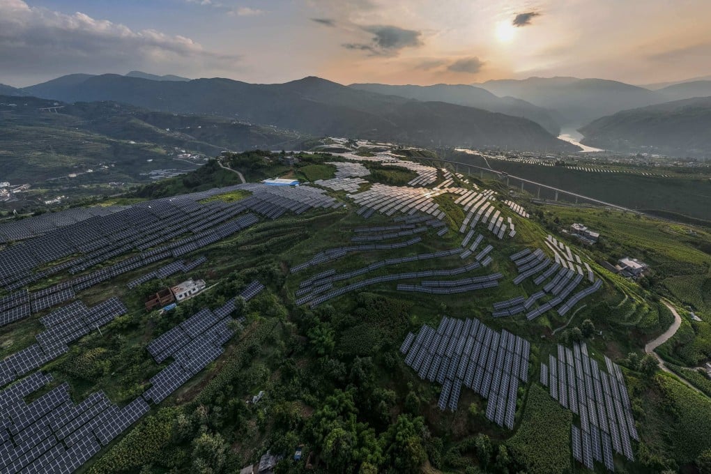 Solar panels are scattered among Sichuan pepper fields in Bijie, in China’s southwestern Guizhou province, on August 16. New research shows China could reach 80 per cent carbon-free electricity as early as 2035 without increasing costs or sacrificing reliability. Photo: AFP