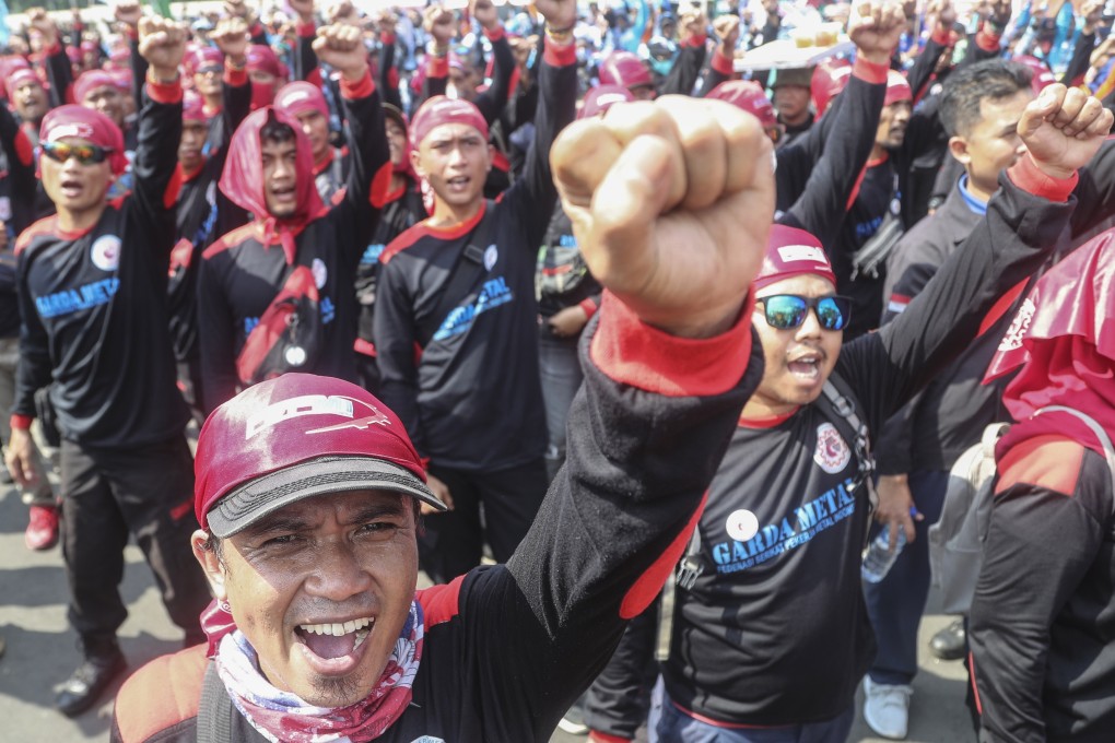 Labourers shout slogans during a protest in Jakarta on Tuesday against Indonesia’s recent fuel price increase. Photo: EPA-EFE