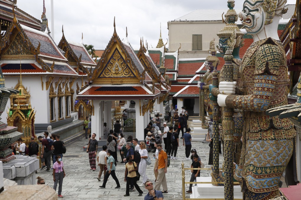 Tourists visit the Emerald Buddha Temple inside the Grand Palace in Bangkok, Thailand. Photo: EPA-EFE