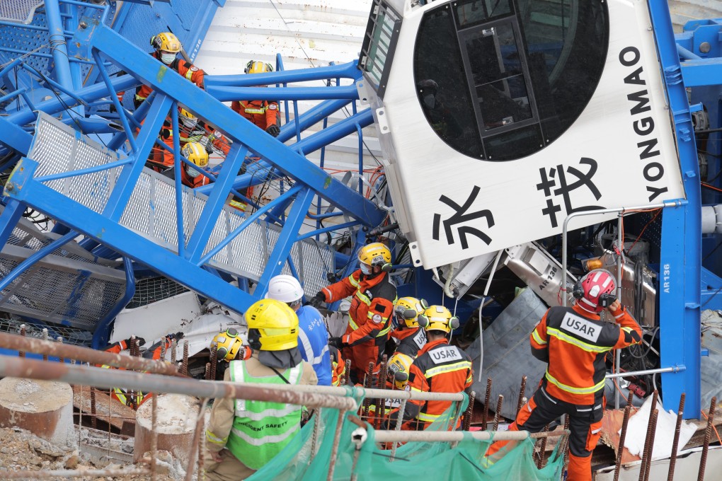 The tower crane collapsed on Wednesday morning, trapping workers and crushing containers on the building site. Photo: Jelly Tse