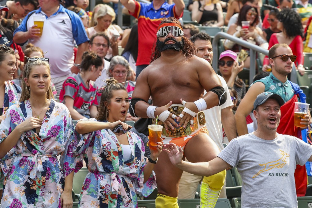 Fans dressed in costumes cheer in the South Stand on the last day of the 2019 Hong Kong Sevens at Hong Kong Stadium. Photo: K.Y. Cheng