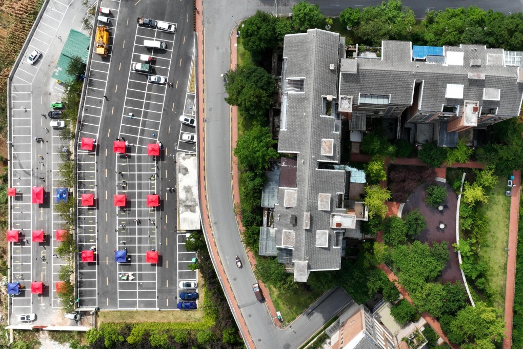An aerial photo shows a community testing site for Covid-19 in a Guiyang district, in southwest China’s Guizhou province, September 5. Residents have complained they were left to starve because of a lockdown. Photo: Xinhua