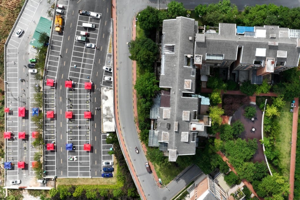 An aerial photo shows a community testing site for Covid-19 in a Guiyang district, in southwest China’s Guizhou province, September 5. Residents have complained they were left to starve because of a lockdown. Photo: Xinhua